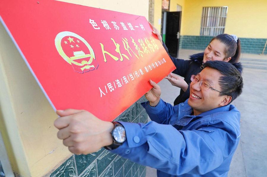 China constantly improves democratic institutions