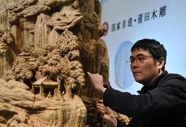 In pics: Wood carving works from China’s Fujian tell China stories to world