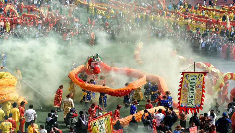 People of Gelao ethnic group celebrate "Maolong Festival" in SW China's Guizhou 	 	People watch a dragon dance competing event during the "Maolong Festival" of Gelao ethnic group in Shiqian County, southwest China's Guizhou Province, Feb. 20, 2024. The festival, as a folk activity for people of the Gelao ethnic group to celebrate the Spring Festival and lantern festival, is listed as one of the national intangible cultural heritages in 2006.