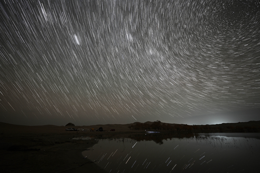 Brilliant starry sky over Luobu Lake in NW China's Xinjiang