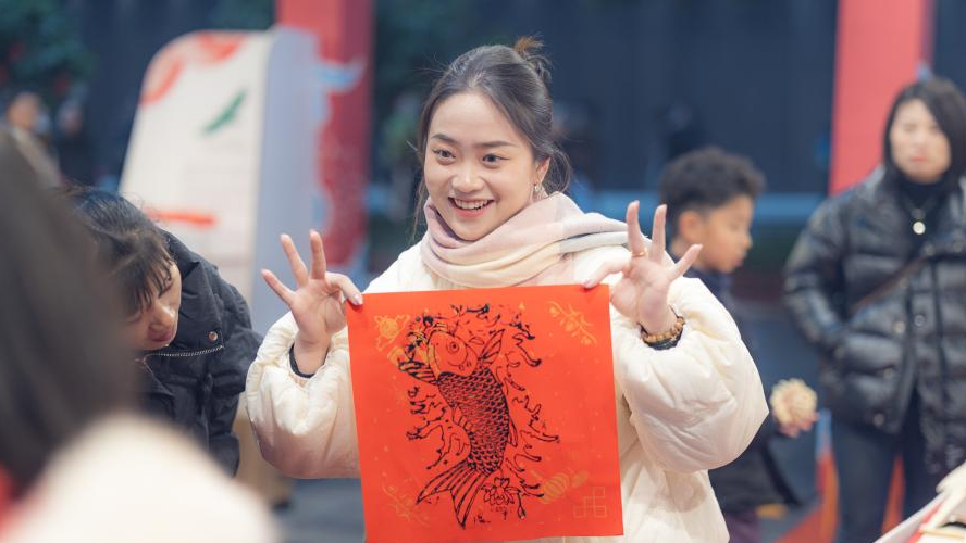 In pics: Inheritor of Liangping New Year Woodblock Prints in SW China's Chongqing