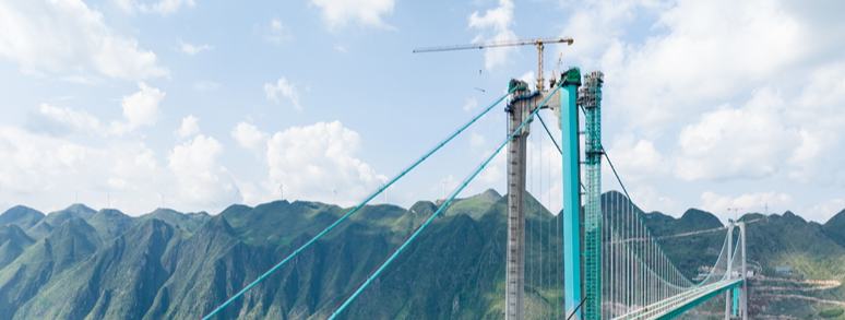 Huajiang Grand Canyon Bridge in SW China's Guizhou to open to traffic on Sept. 28 