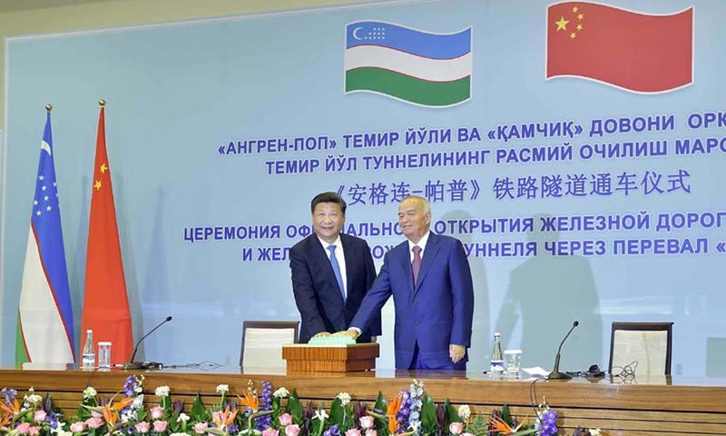 On 22 June 2016, Chinese President Xi Jinping (left) and then President of Uzbekistan Islam Karimov jointly attend in Tashkent the opening of the Angren-Pap railway line via video link