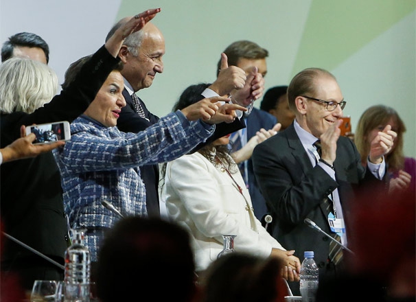 Representatives celebrating the adoption of the Paris Agreement at COP21, December 12, 2015