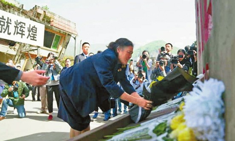 HRH Princess Sirindhorn visits the earthquake site in the old Beichuan County and lays flowers in 2018