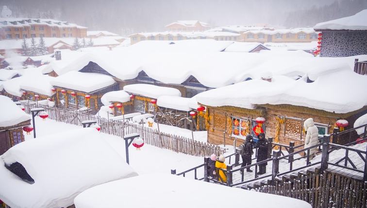 Mesmerizing winter scenery draws crowds to China's 'Snow Town' 	 	With well-arranged rooftops covered in thick blankets of snow, as well as eye-catching, unique snow views featuring natural scenes that resemble "snow mushrooms" and "snow cakes," Shuangfeng Forest Farm, known as China's "Snow Town," has been transformed into a winter wonderland.