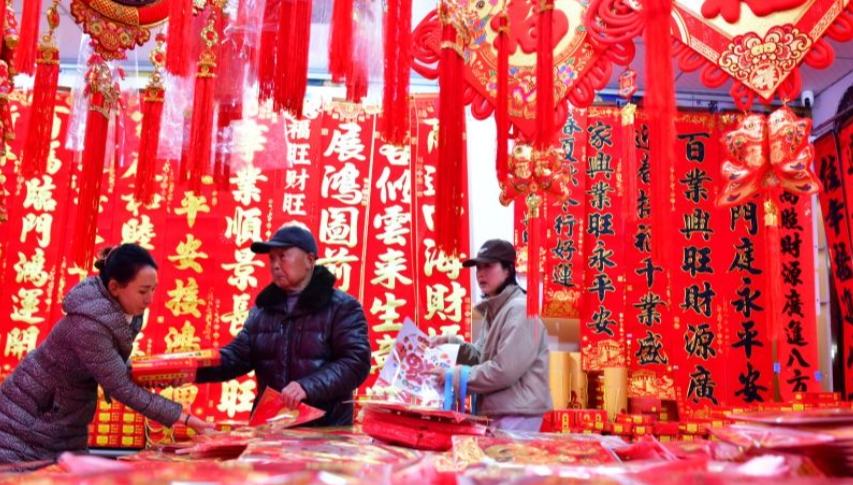 Markets across China bustling as people prepare for upcoming Spring Festival 	 	People shop for Chinese New Year decorations at a market in Jiande City, east China's Zhejiang Province, Feb. 13, 2026. Markets across the country are bustling nowadays as people flock there to stock up on goods in preparation for the upcoming Spring Festival, or the Chinese New Year.