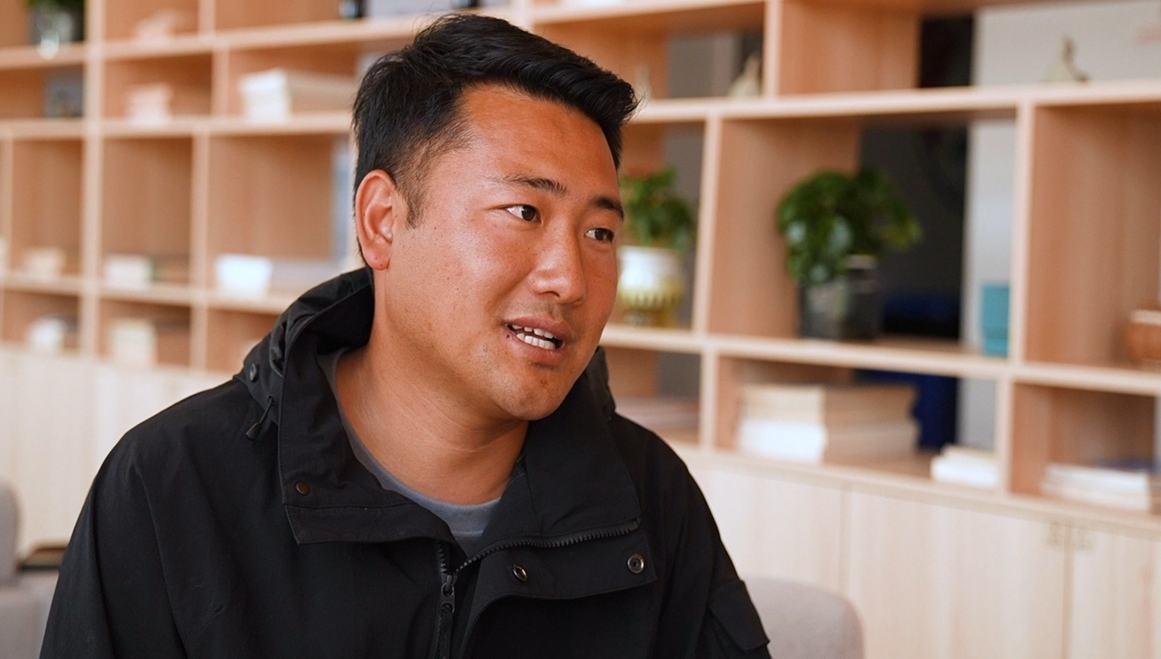 Decoding China: People's democracy embodied in transformation of once-isolated village        