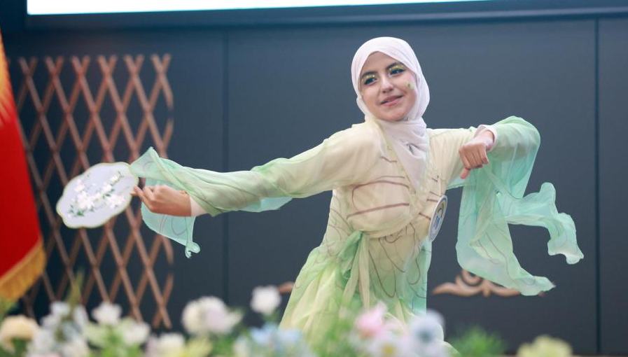 Contestants perform during 19th "Chinese Bridge" Chinese proficiency competition in Bishkek, Kyrgyzstan 	 	A contestant performs during the national final of the 19th "Chinese Bridge" Chinese proficiency competition for foreign secondary school students in Bishkek, Kyrgyzstan, May 14, 2026. 